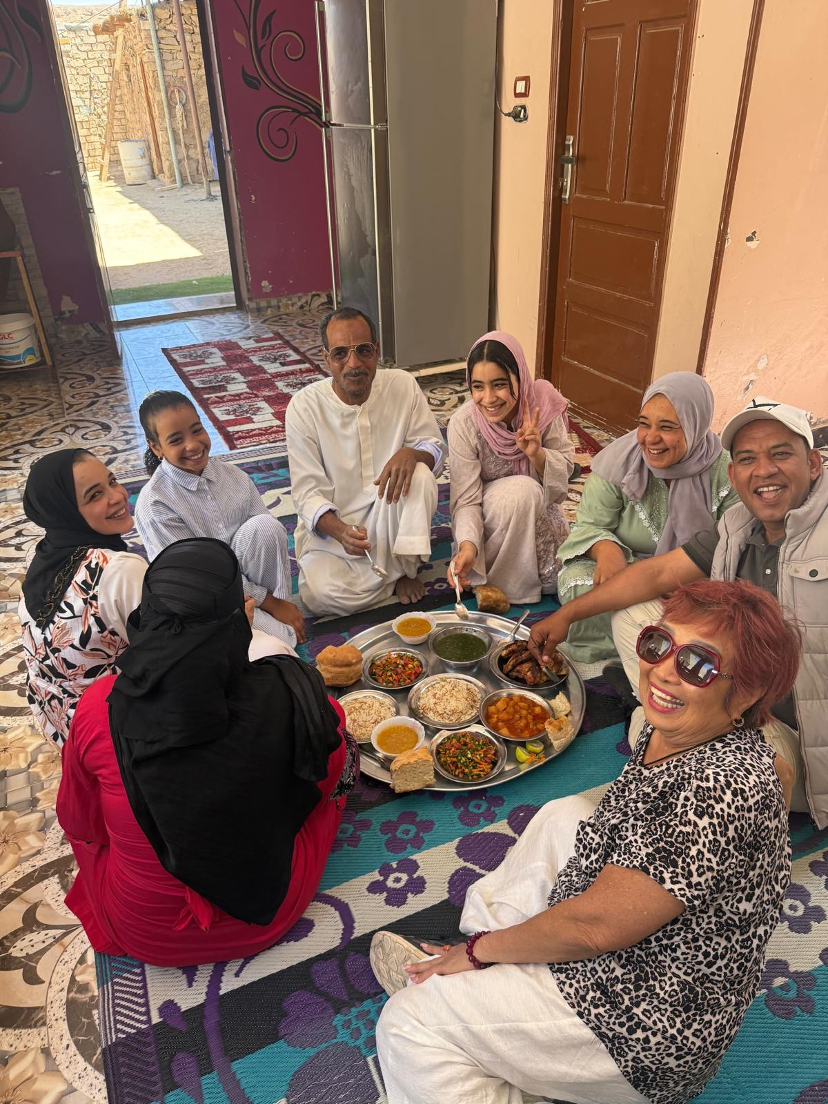 Sharing a home-cooked meal with an Egyptian family